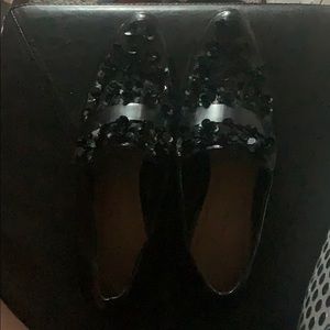 Black floral loafers